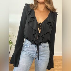 More To Come, medium, black.